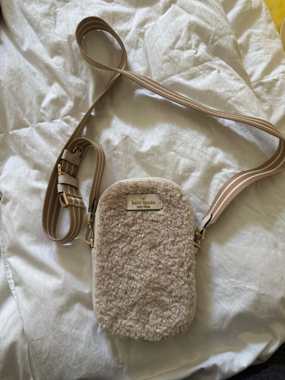 kate spade fuzzy crossbody phone bag in beige